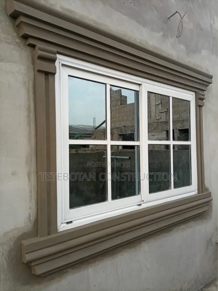Window Design Decor Molding by Hand Using Mortar
