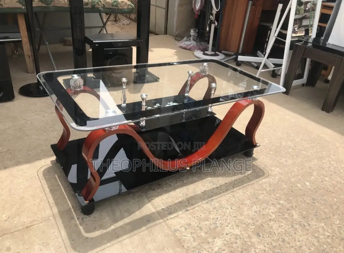 Glass Center Table With Red and Black Ceramic Design Base