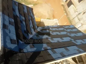 Parapet Woodwork and Installation of Stone Coated Sheets