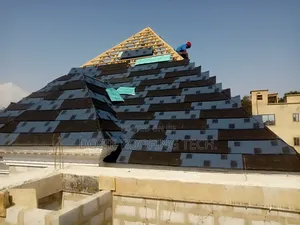 Parapet Woodwork and Installation of Stone Coated Sheets