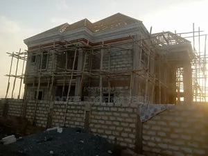 Ero Tiles Roofing Sheet and Wood Work