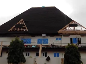Wood Work Roofing Tiles Installation and Rain Gutter
