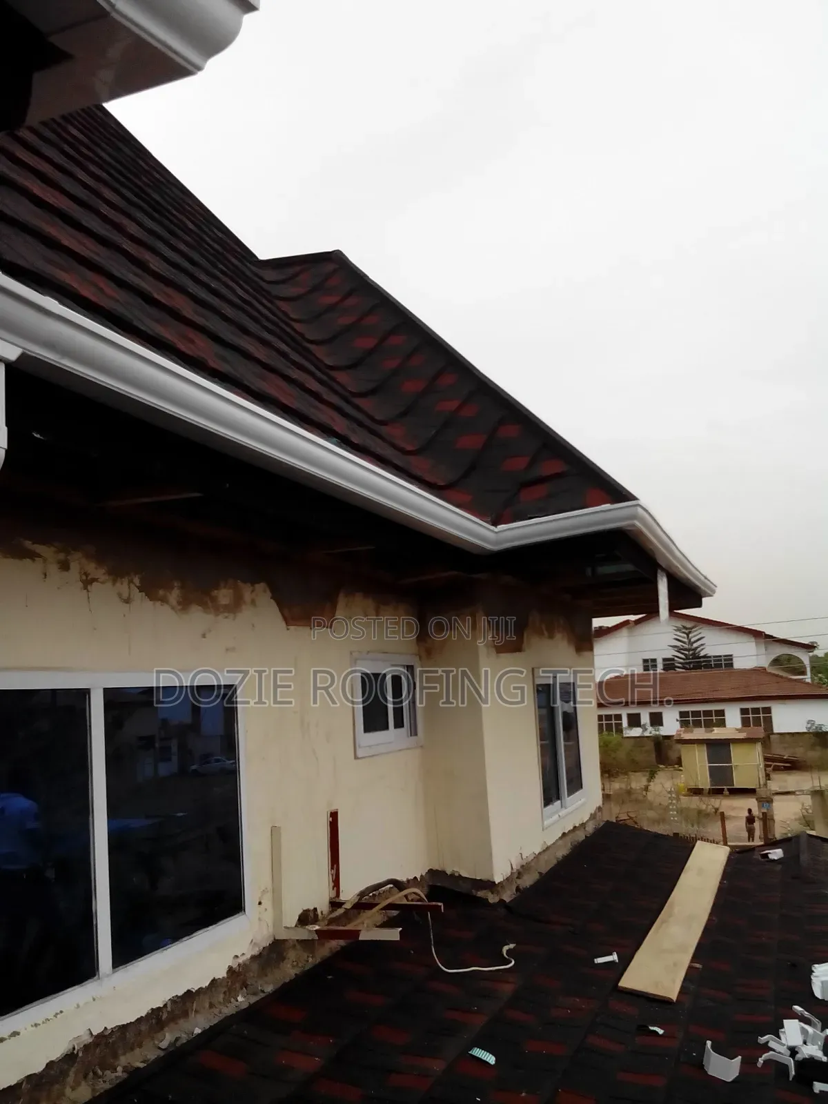 Wood Work Roofing Tiles Installation and Rain Gutter