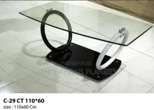 Glass Center Table With Ring Stand Design