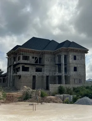 Shingles Roofing and Concrete Parapet