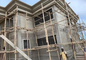 Shingles Roofing and Concrete Parapet