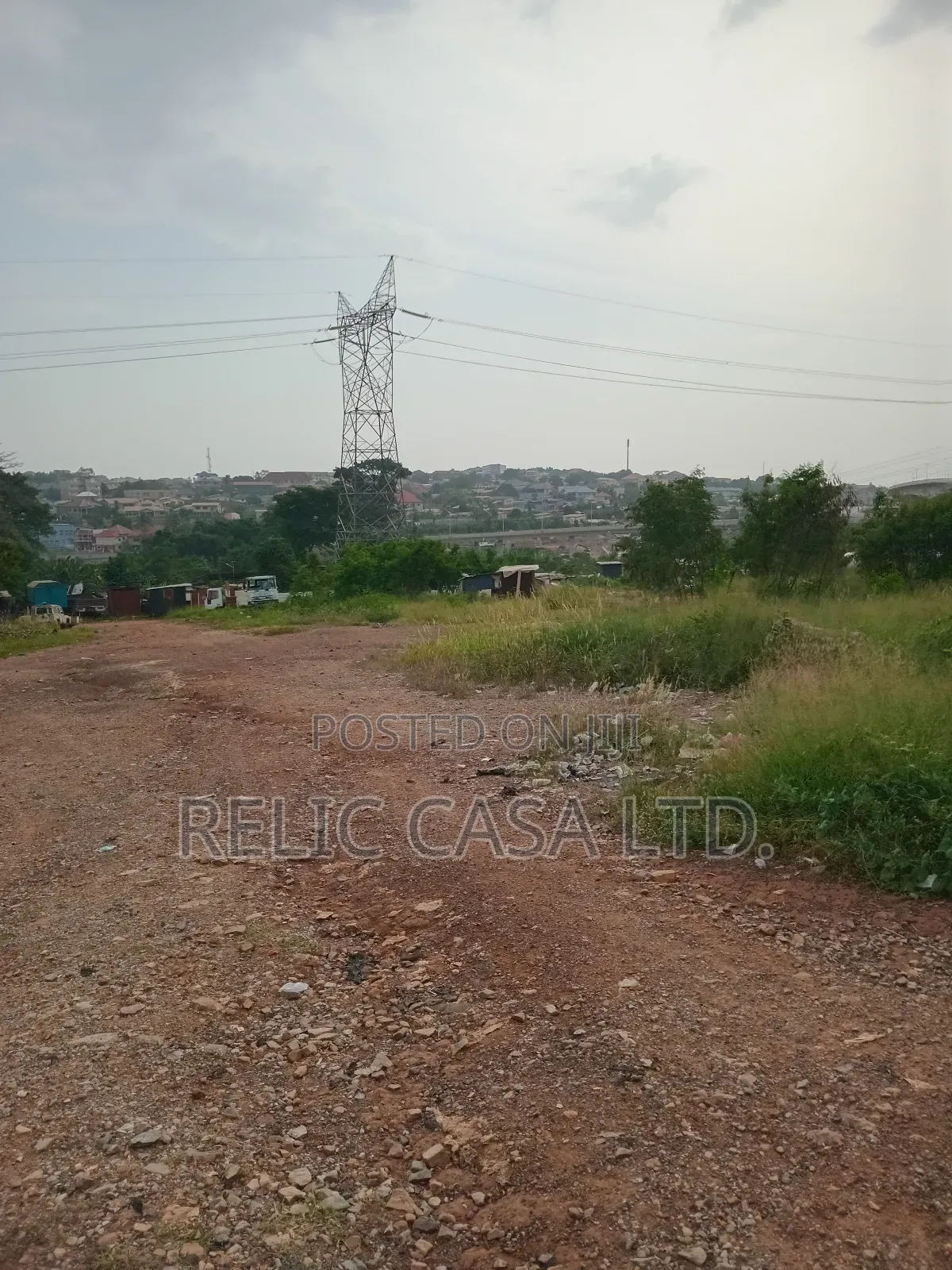 9 Acrs of Land at Pokuase Just by the Road for Sale