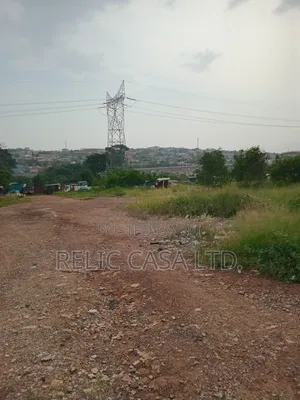 9 Acrs of Land at Pokuase Just by the Road for Sale