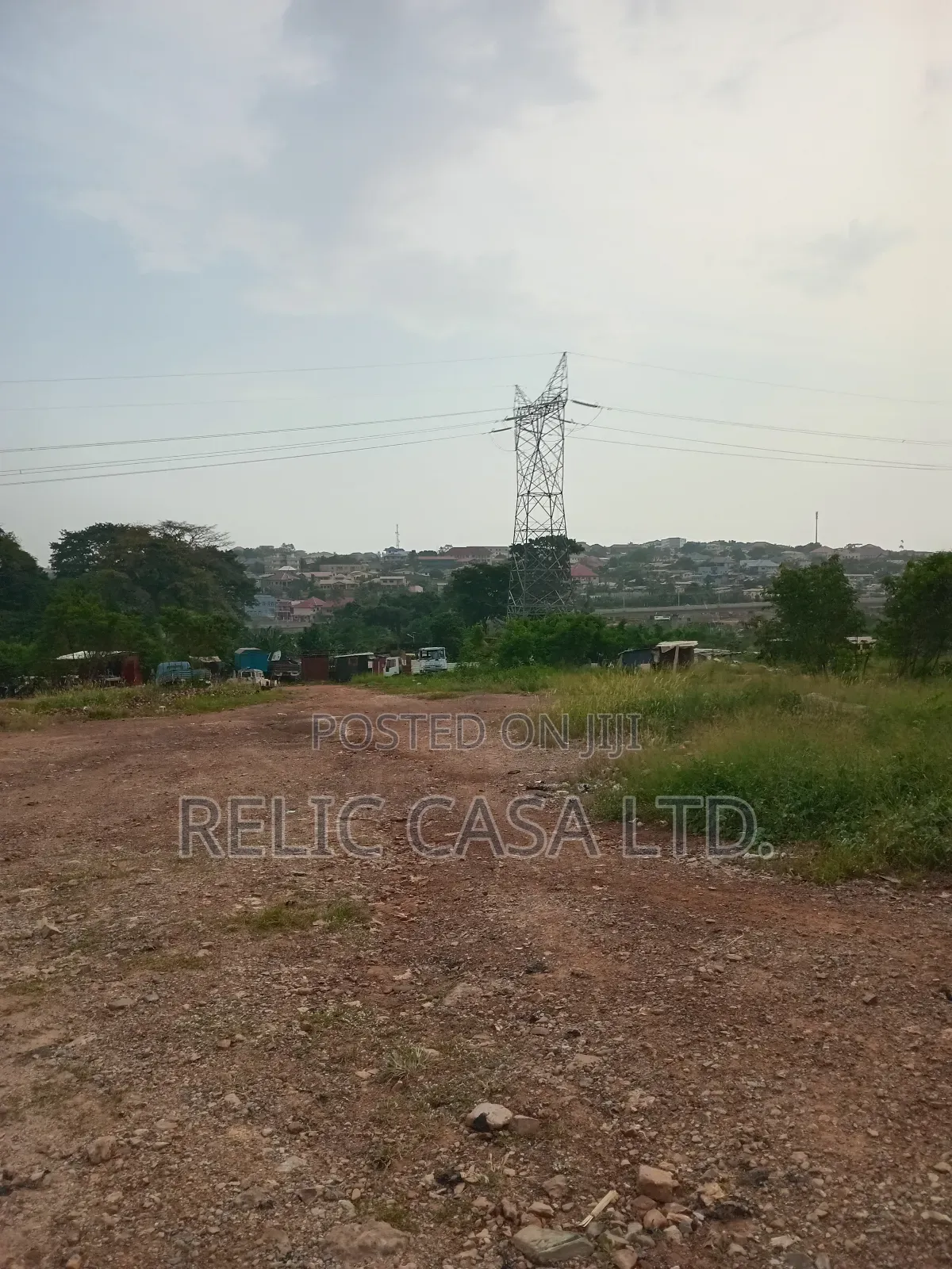 9 Acrs of Land at Pokuase Just by the Road for Sale