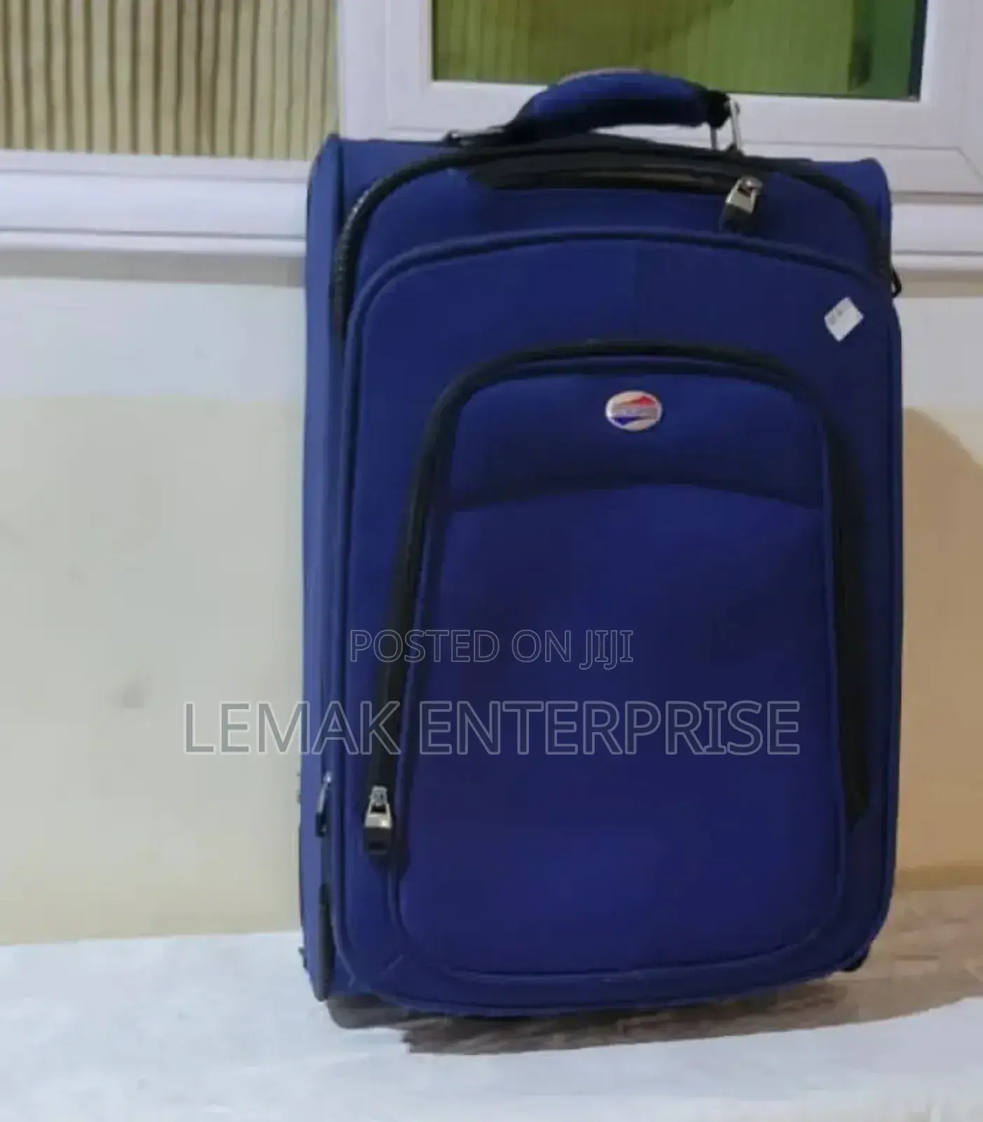 American Tourister Splash Blue Traveling Bag S