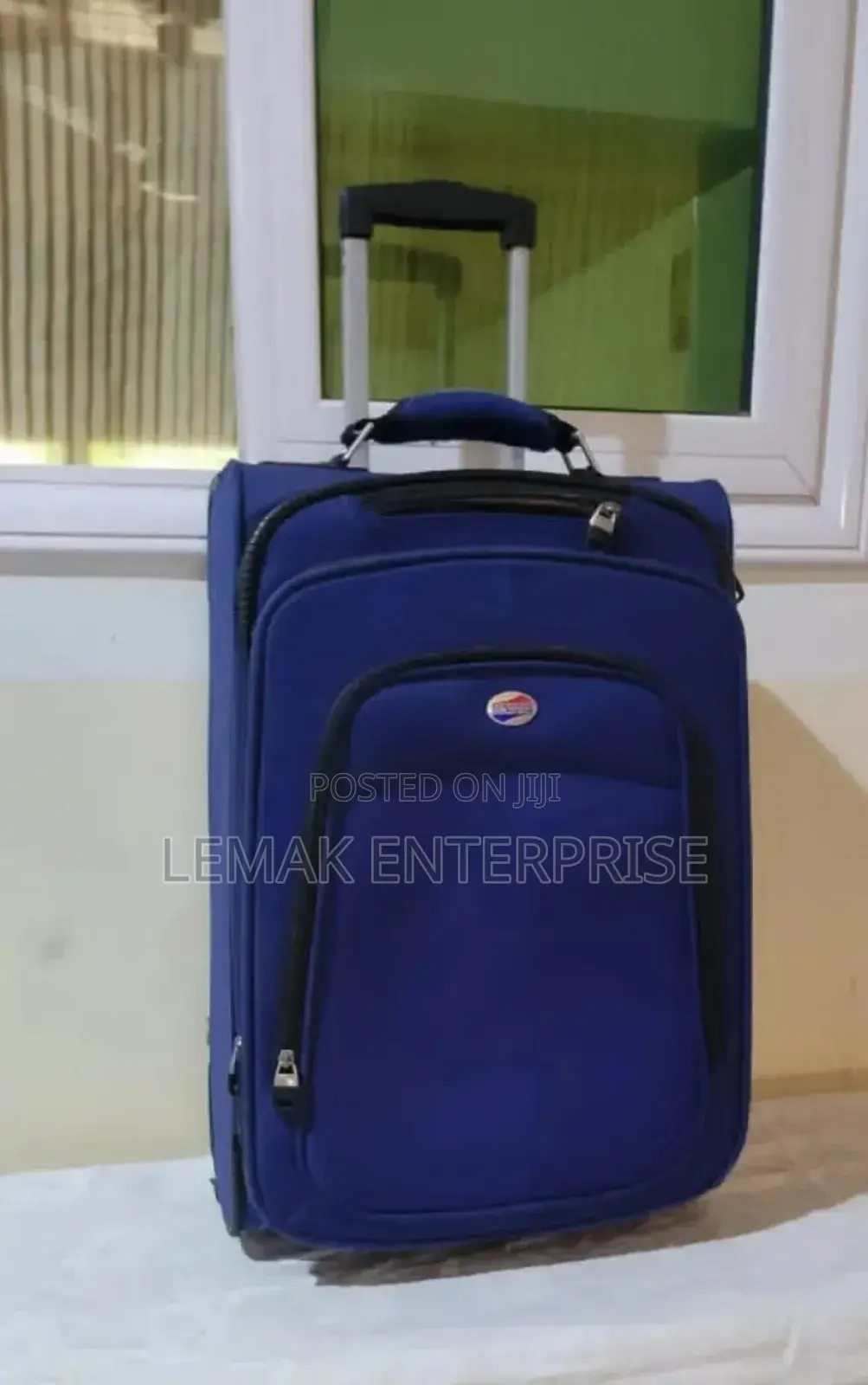 American Tourister Splash Blue Traveling Bag S