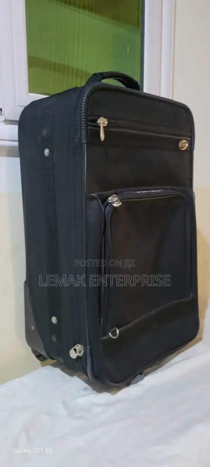 American Tourist Black Color Small Size Traveling Suitcase