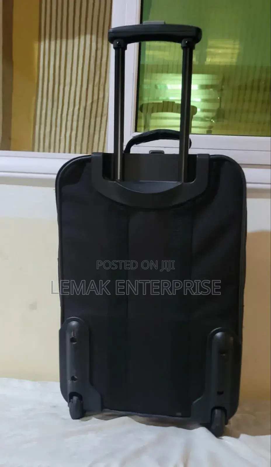 American Tourist Black Color Small Size Traveling Suitcase