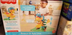 Fisher-Price Bounce Spin Lion Stationary Ride-On, 12m+