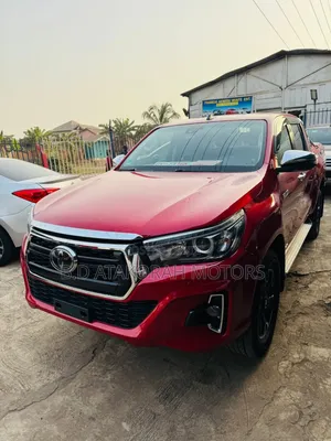Photo - Toyota Hilux Rugged X 4x4 2018 Red