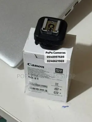 Canon Ad-E1 ( Speedlight Converter for Canon R50)