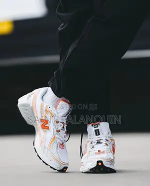 New Balance 740 Orange Blanche - Sport