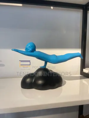 The Flying Man Figurine in Blue