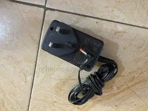 TM1 12v 2A Laptop Charger/Adapter Original.