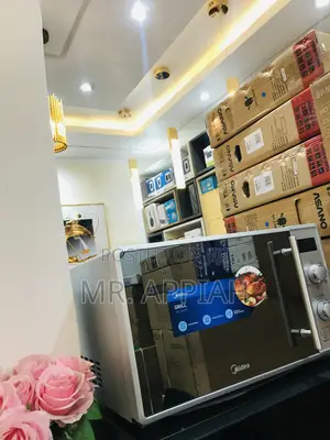 Choose Midea 25ltr Electric Countertop Microwave.