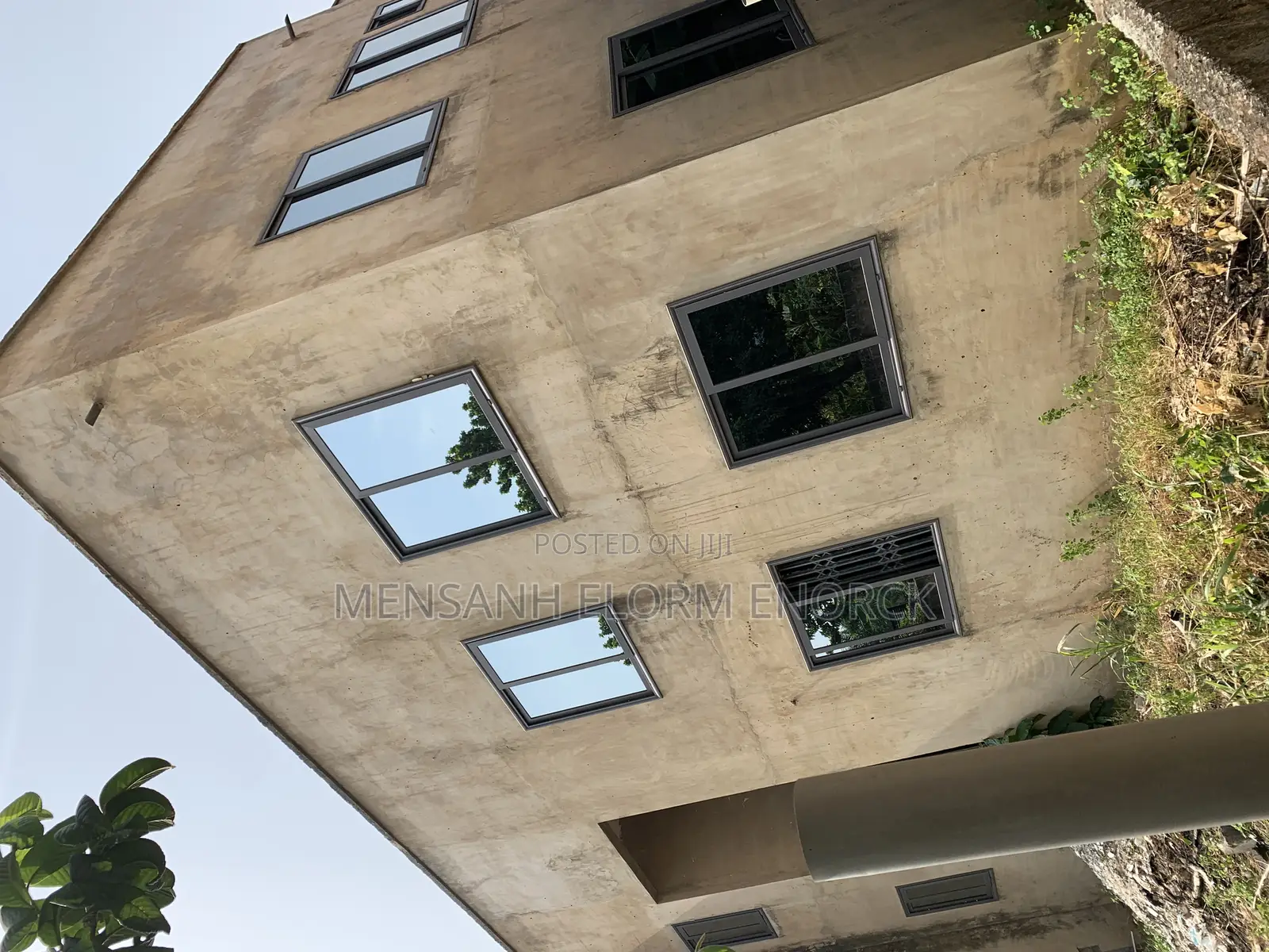 Building House and Face Wall