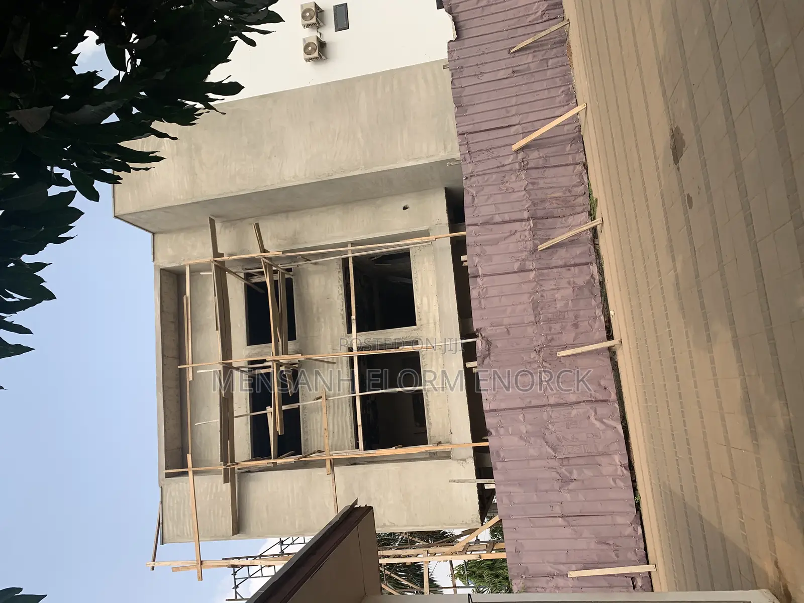 Building House and Face Wall