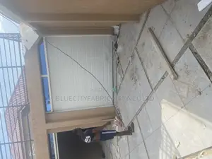 Automated Garage Door With Fanlight and Remote