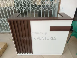 Brown and White Information Desk