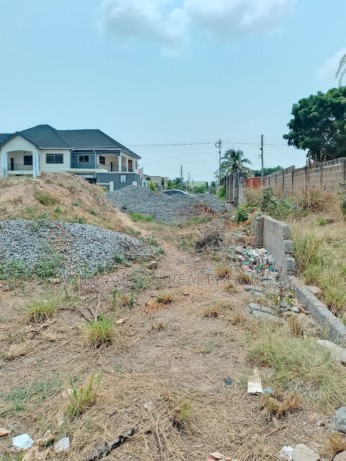 TDC Walled 60 by 140ft Half Plot of Land 4sale,Spintex