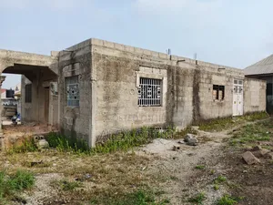 Five Bedrooms Uncompleted Store Building