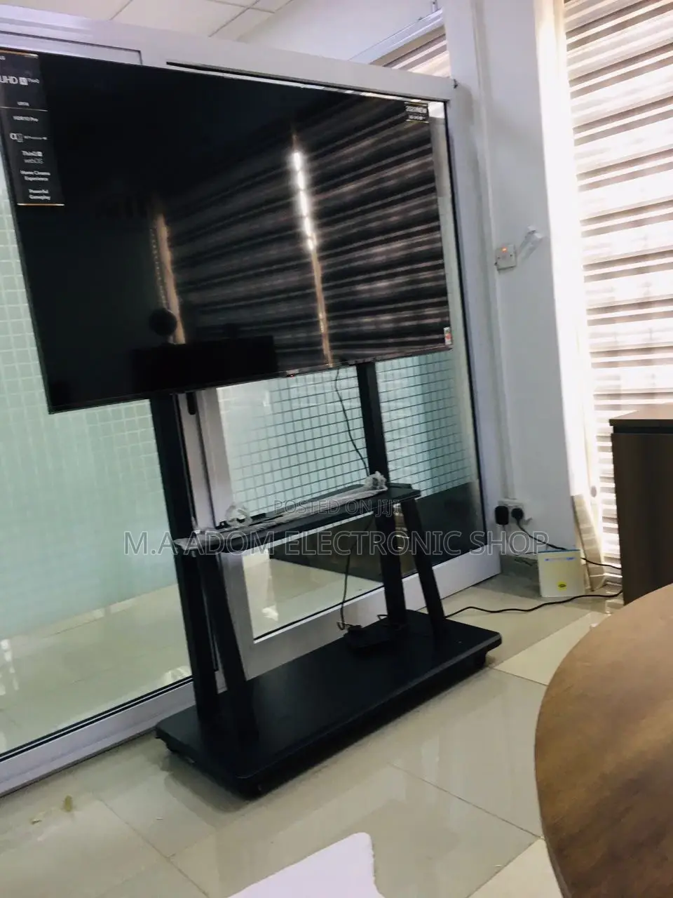 Unleash Your Big Screen:The Atlas Rolling TV Cart (70"-100")