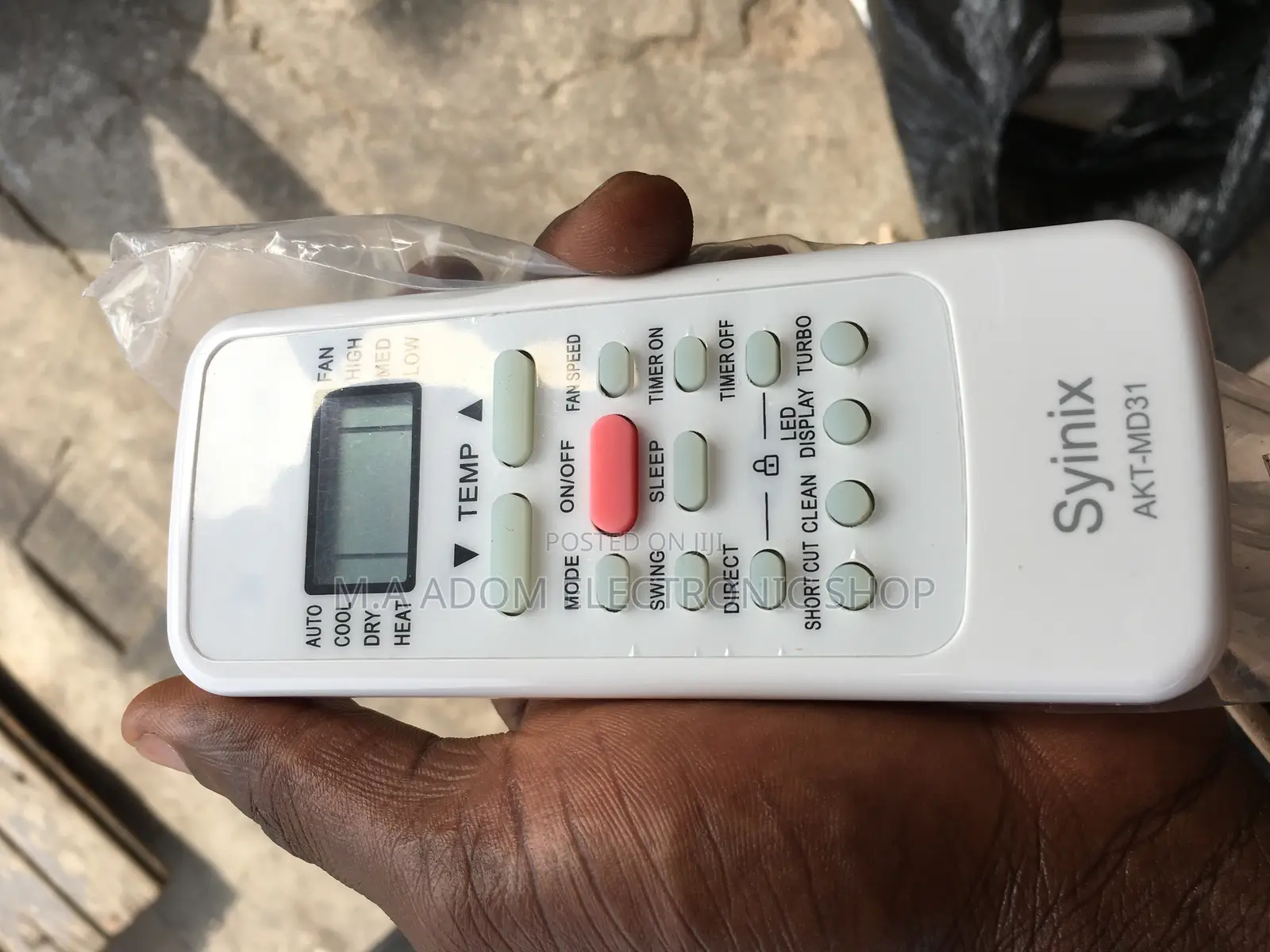 White Color With Red Power Bottoms Syinix Remote