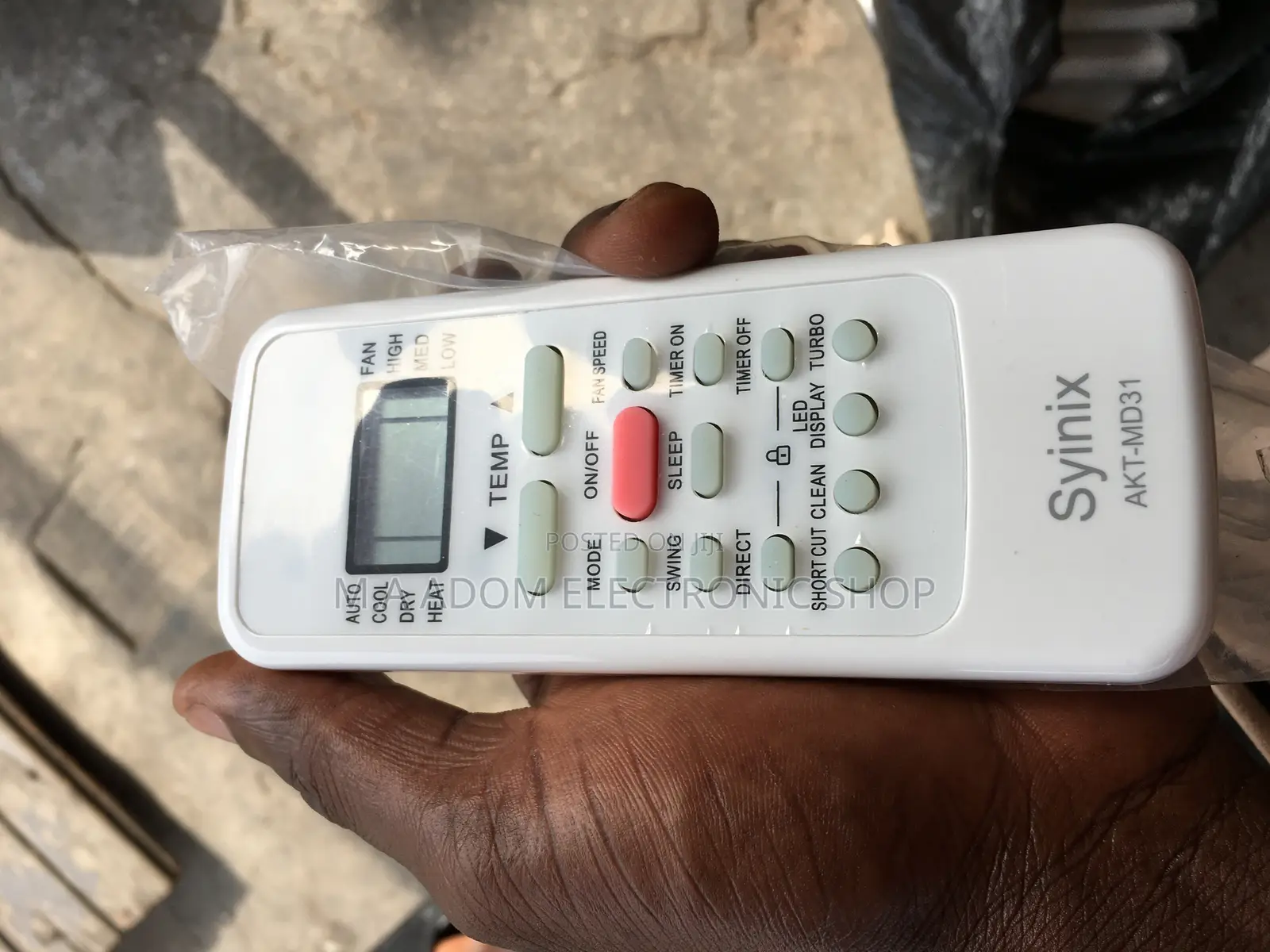 White Color With Red Power Bottoms Syinix Remote
