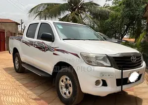 Photo - Toyota Hilux 2014 White
