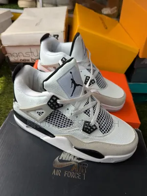 Jordan 4 Sneakers (Black and White)