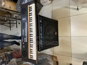 Photo - Roland Ex-10 Keyboard Plus Yamaha Keyboard Combo
