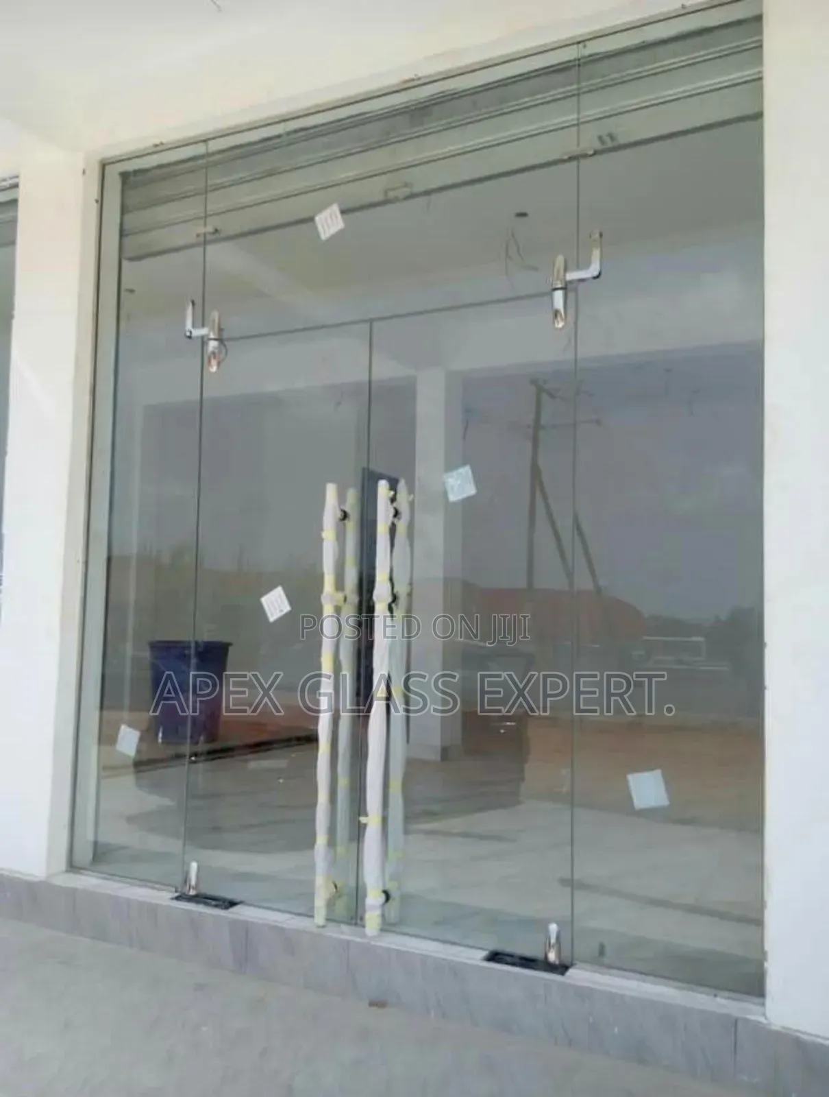 Frameless Double Glass Door by Apexglassexpert