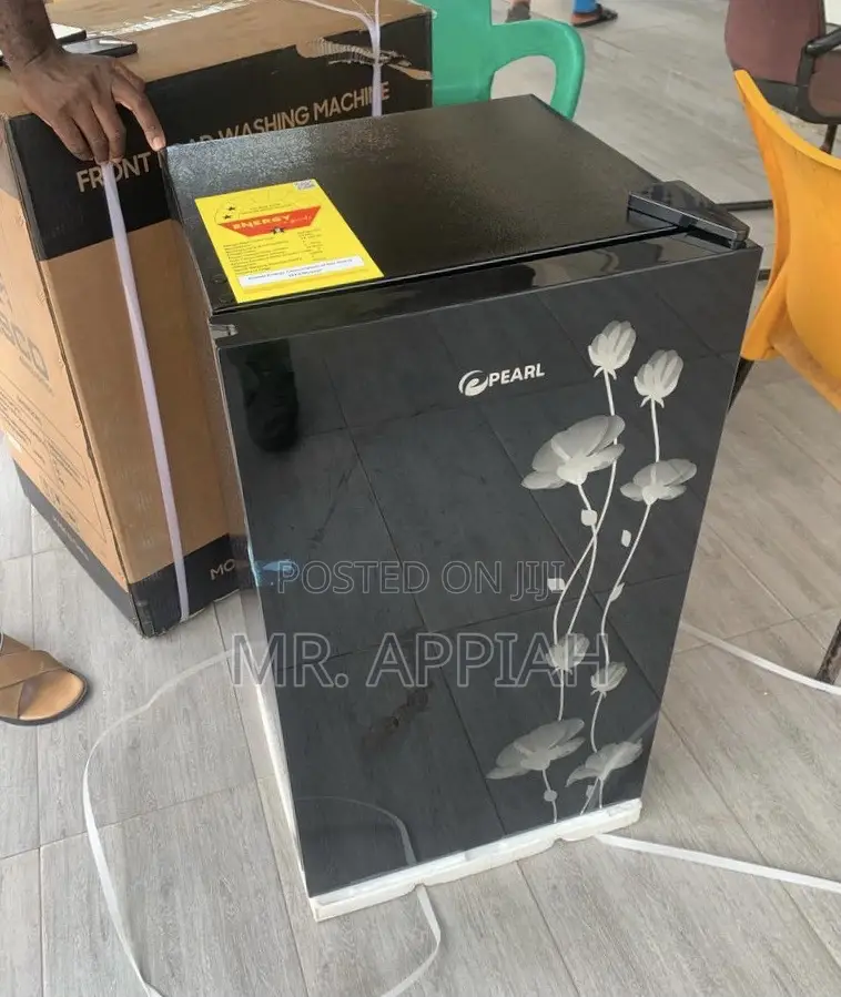 Stay Cool With Pearl Table Top Single Door Fridge.
