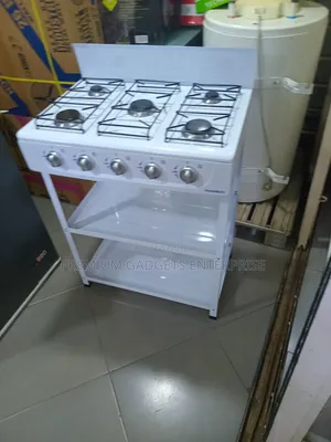 Sleek Finish Nasco White 5 Burner Gas Stove With Shelves