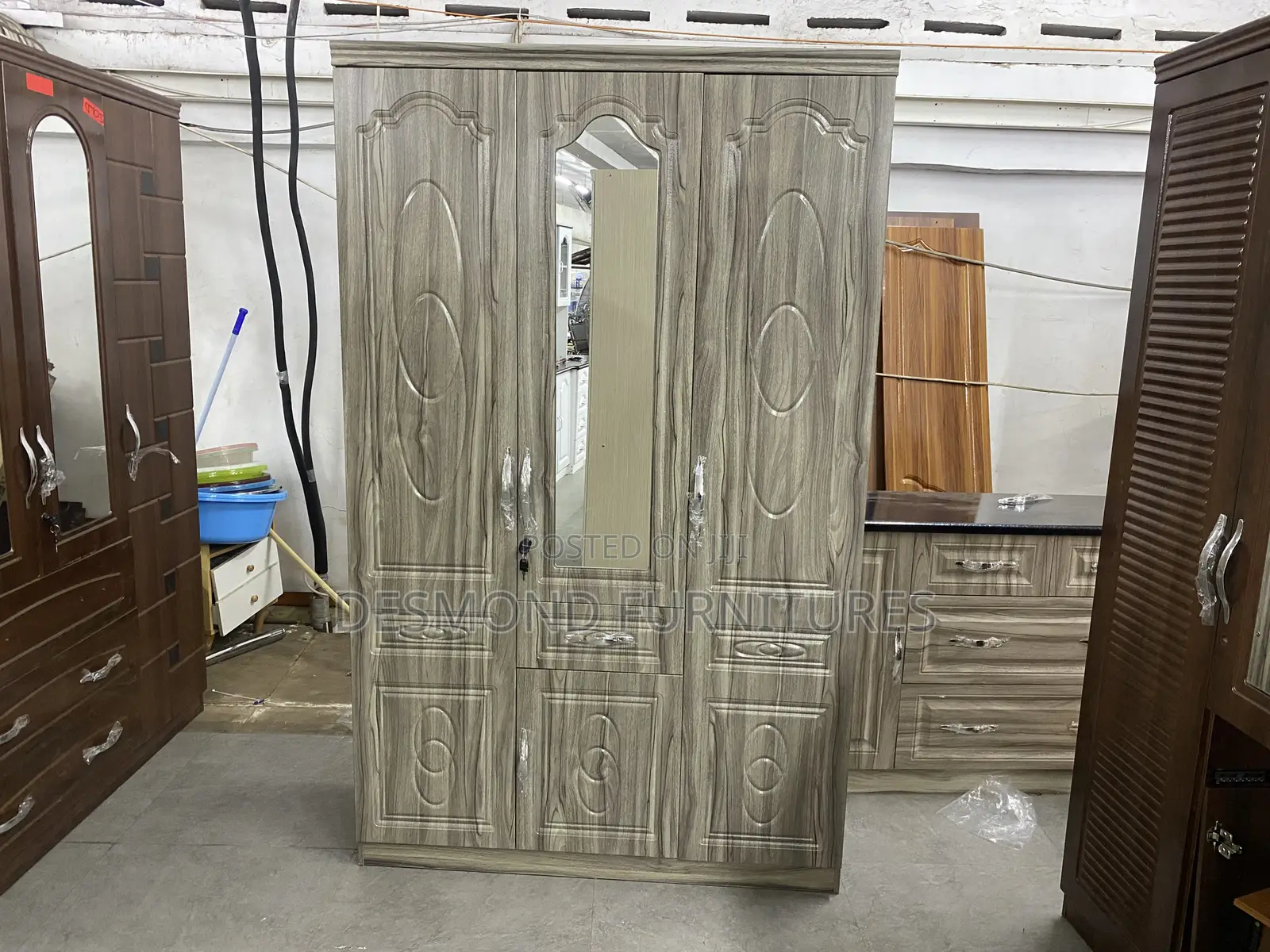 Three Doors Wardrobe With A Mirror 8153