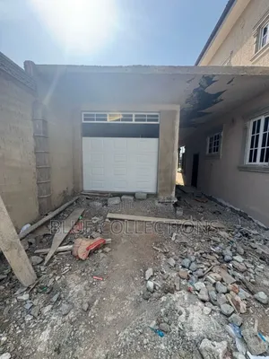 Automated Garage Door With Fanlight and Remote