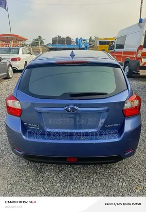 Subaru Impreza 2.0i Sport Premium PZEV 4dr Hatchback AWD (2.0L 4cyl 5M)