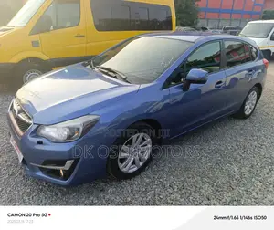 Subaru Impreza 2.0i Sport Premium PZEV 4dr Hatchback AWD (2.0L 4cyl 5M)