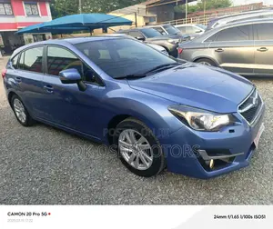 Subaru Impreza 2.0i Sport Premium PZEV 4dr Hatchback AWD (2.0L 4cyl 5M)