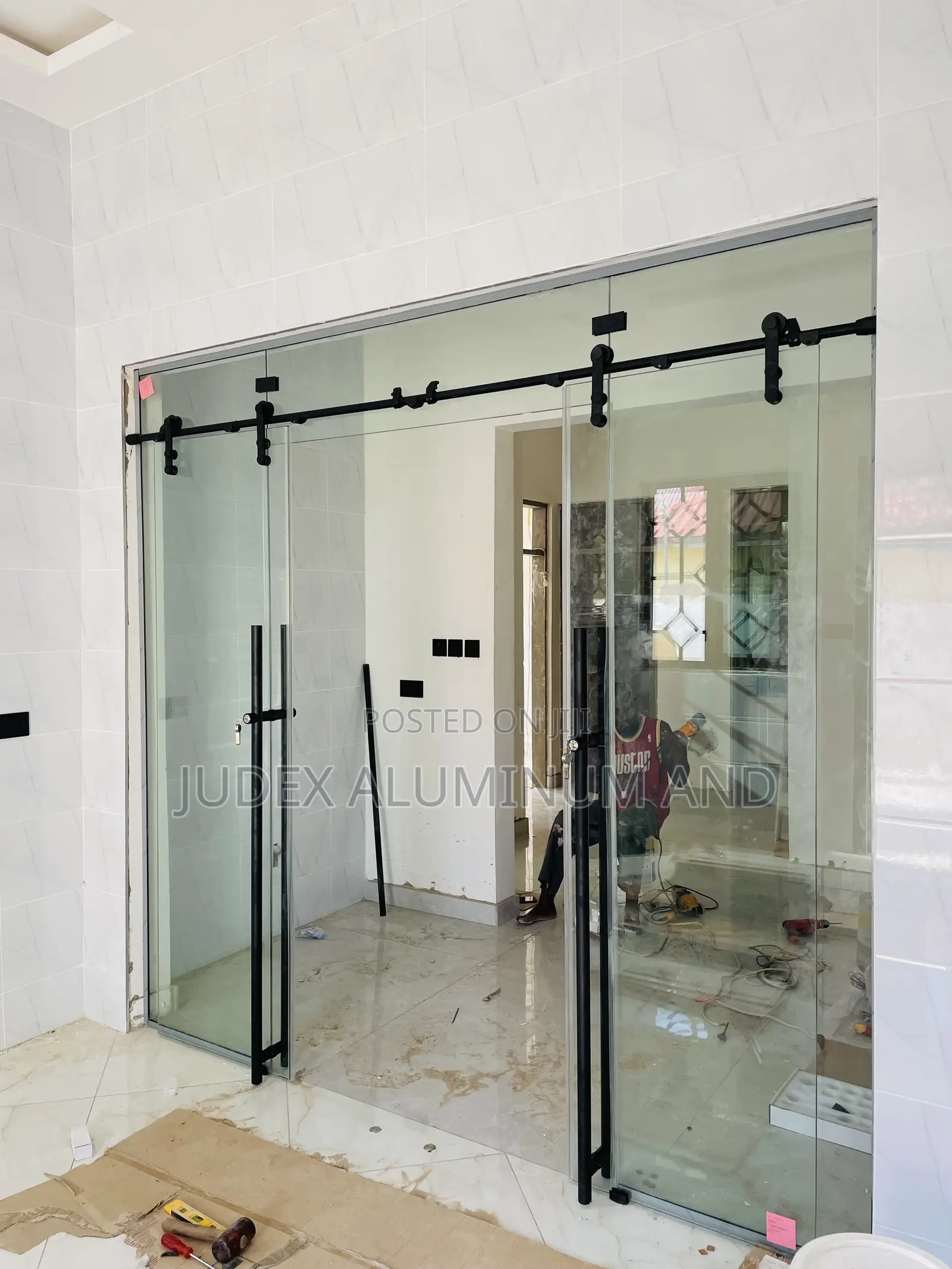 Frameless Double Sliding Doors With Black Accessories
