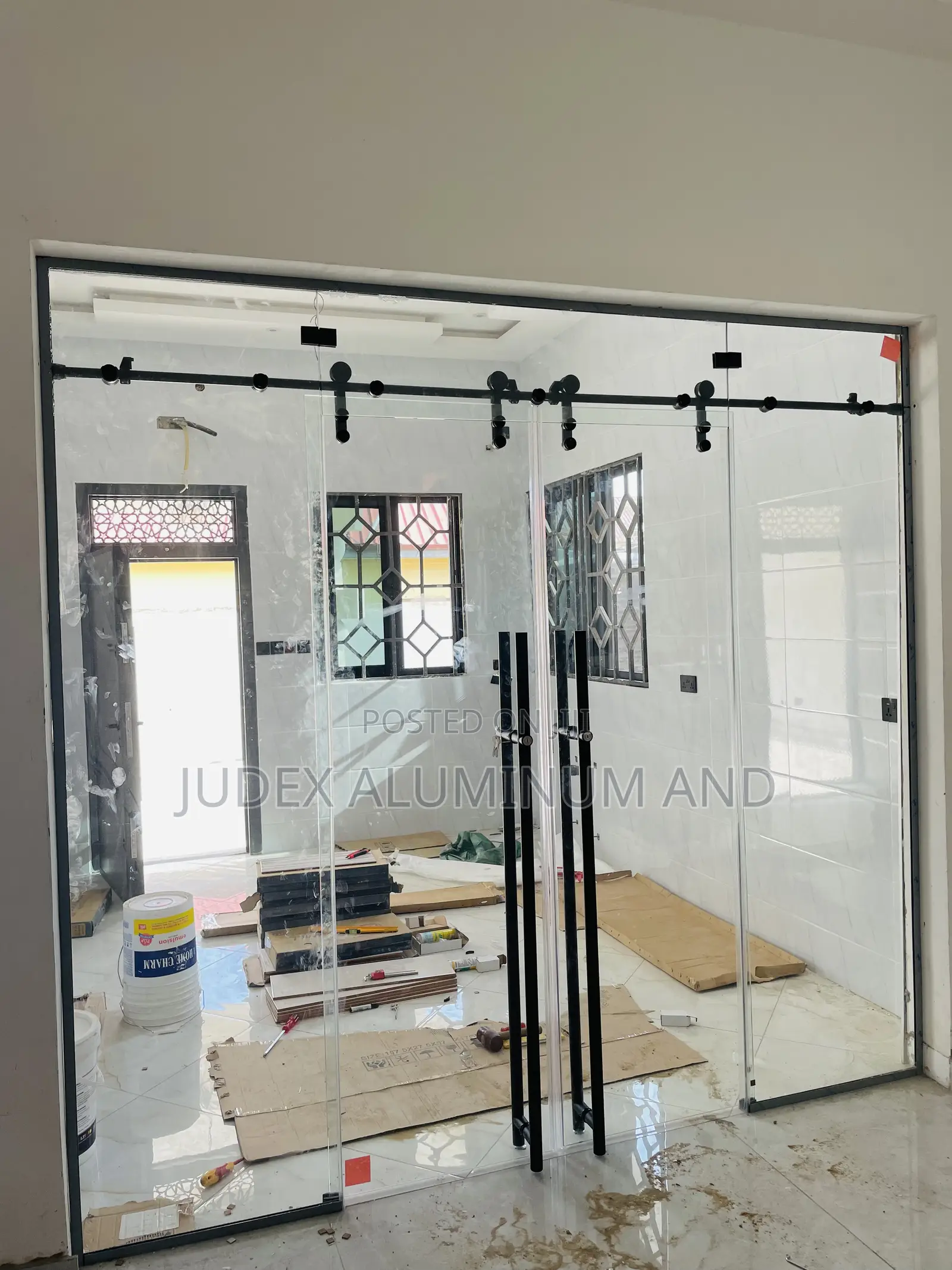 Frameless Double Sliding Doors With Black Accessories