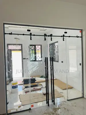 Frameless Double Sliding Doors With Black Accessories