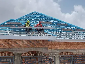 Installation of Rain Gutter and Roofing