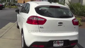 Photo - Kia Rio EX 4dr Hatchback (1.6L 4cyl 6A) 2014 White