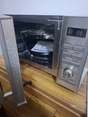 25.L Delonghi Convection Microwave Grill From Uk